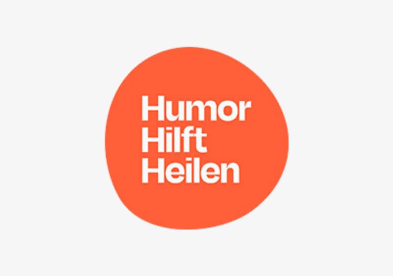 Logo mit Text Humor hilft heilen