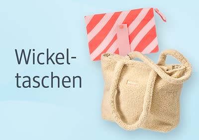 Zwei Wickeltaschen auf blauem Hintergrund