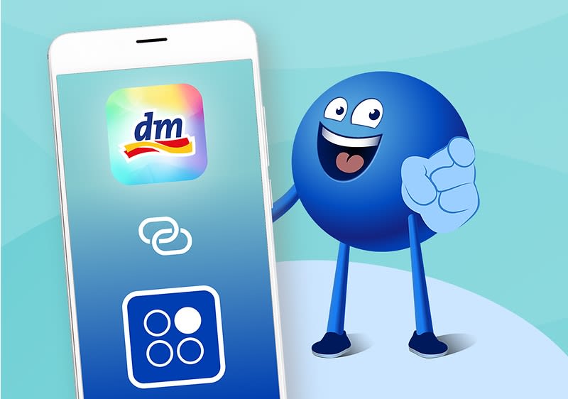 Smartphone mit dm-App Logo und PAYBACK App-Logo mit Verbunden-Zeichen