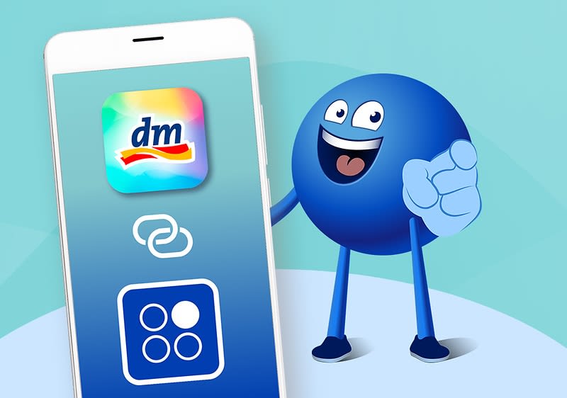 Smartphone mit dm-App Logo und PAYBACK App-Logo mit Verbunden-Zeichen