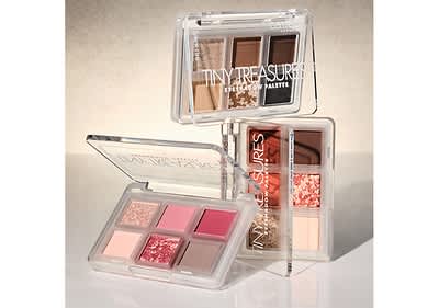 Drei Lidschattenpaletten in verschiedenen Farben