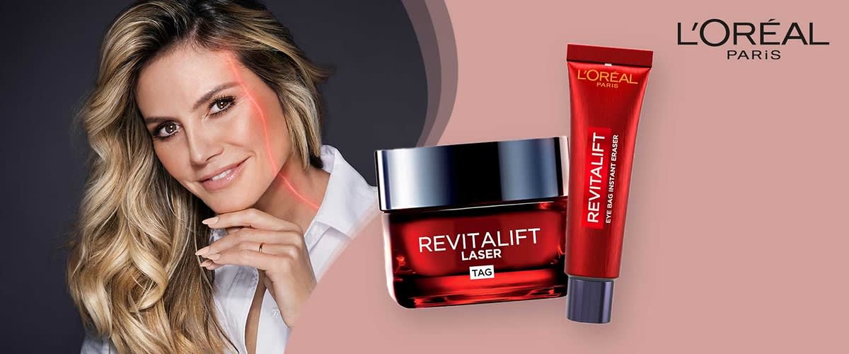 Zwei L'Oréal Paris Revitalift Produkte auf einem rosa Hintergrund, links eine rote Tube mit der Aufschrift Revitalift Eye Bag Instant Eraser und rechts ein quadratisches Glasgefäß mit schwarzem Deckel und der Aufschrift Revitalift Laser X3 Tag, oben rechts das L'Oréal Paris Logo
