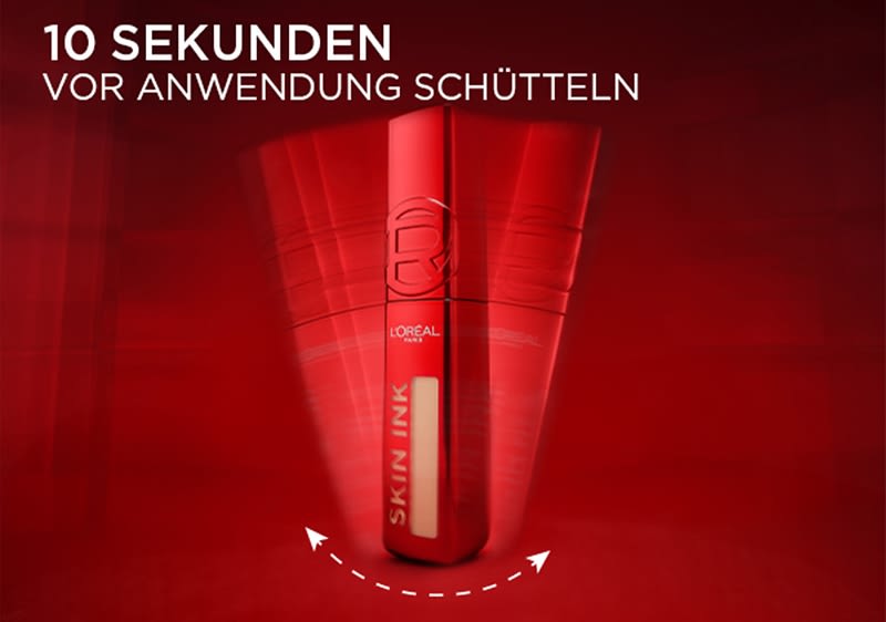 Rotes Hautpflegeprodukt mit Schüttelhinweis