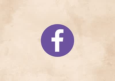 Facebook-Logo auf beigem Hintergrund