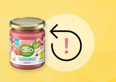 Rückruf Symbol und dmBio Cashewmus Himbeere