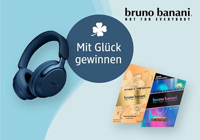 Auf dem Bild sind dunkelblaue Bose-Kopfhörer, zwei Parfümverpackungen von bruno banani mit den Aufschriften Intense & Carefree und Vanilla Musk sowie eine Parfümflasche mit der Aufschrift bruno banani Vanilla Musk Eau de Toilette 250 ml zu sehen, daneben steht in einem braunen Kreis Mit Glück gewinnen und oben rechts ist das bruno banani Logo mit dem Slogan Not for Everybody abgebildet.