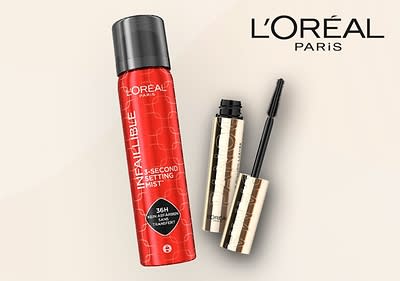 Eine rote Sprühflasche mit der Aufschrift „Infallible 24H Second Setting Mist“ neben einer goldenen Mascara mit schwarzem Bürstchen, oben rechts das Logo von L'Oréal Paris