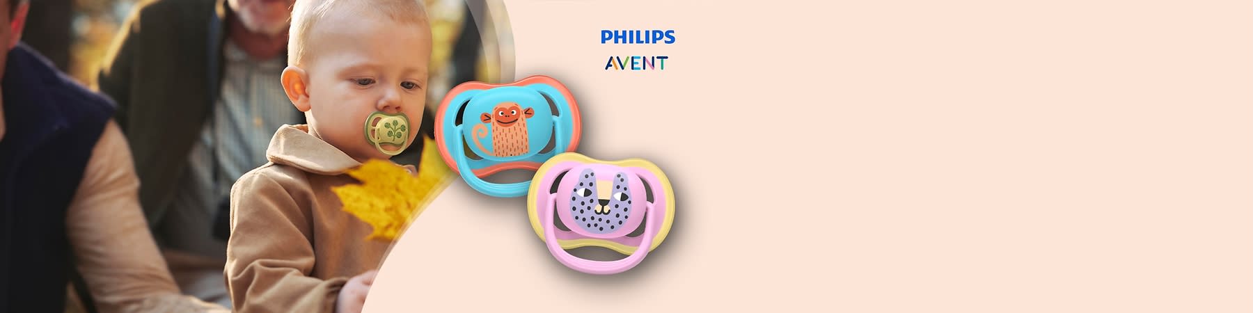 Zwei Schnuller mit Tiermotiven, links ein blauer Schnuller mit einem orangefarbenen Affen, rechts ein rosa Schnuller mit einem grauen Leoparden, oben rechts das Logo von Philips Avent