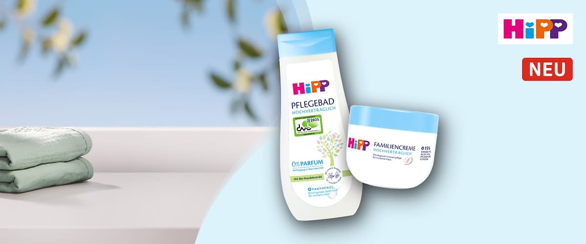Eine Produktverpackung von Hipp zeigt eine Flasche Pflegebad und eine Dose Familiencreme. Oben rechts das Hipp-Logo und ein rotes Feld mit der Aufschrift „NEU“