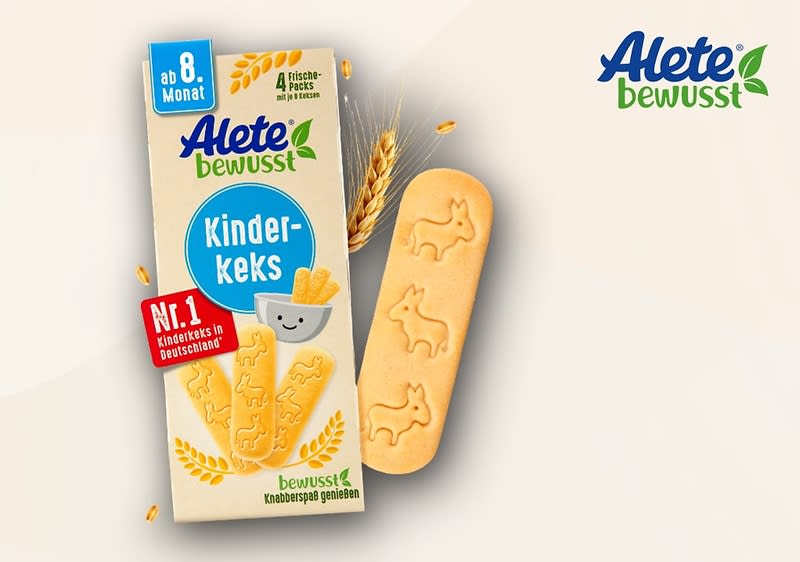 Eine Verpackung von Alete bewusst Kinder-Keks mit der Aufschrift „ab 8. Monat“ und „Nr. 1 Kinderkeks in Deutschland“, daneben ein Keks mit Tiermotiv, oben rechts das Alete bewusst Logo