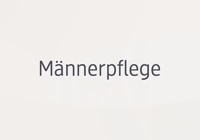 Der Text „Männerpflege“ steht in dunkler Schrift auf einem hellen Hintergrund