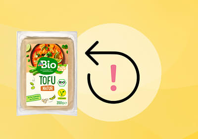 Rückruf Symbol und dmBio Tofu Natur