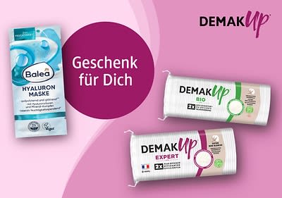 Links eine blaue Verpackung der Balea Hyaluron Maske mit der Aufschrift „Hyaluron Maske“, rechts zwei Verpackungen von Demak'Up, oben Bio mit grünem Logo und unten Expert mit lila Logo, in der Mitte ein lila Kreis mit dem Text „Geschenk für Dich“