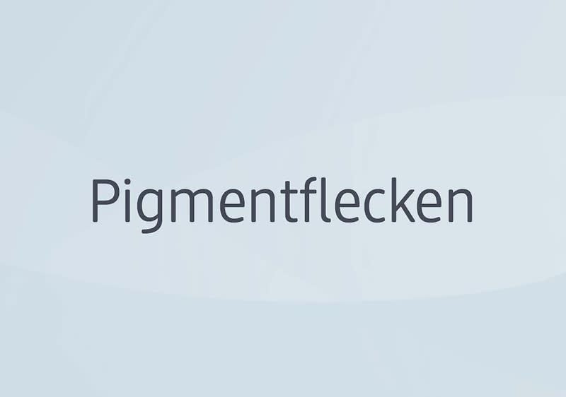 Der Text „Pigmentflecken“ auf einem hellrosa Hintergrund