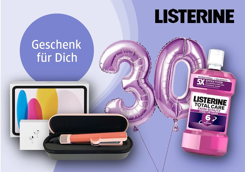 Listerine Logo oben rechts, lila Mundspülungsflasche mit Aufschrift „Listerine Total Care Zahn Schutz“, links ein schwarzes Etui mit rosa Zahnbürste, daneben ein Tablet mit Farbverlauf, Text „Geschenk für Dich“, Testsieger-Siegel von Stiftung Warentest mit Bewertung „Sehr gut (1,4)“ und Hinweis auf Ausgabe 03/2025