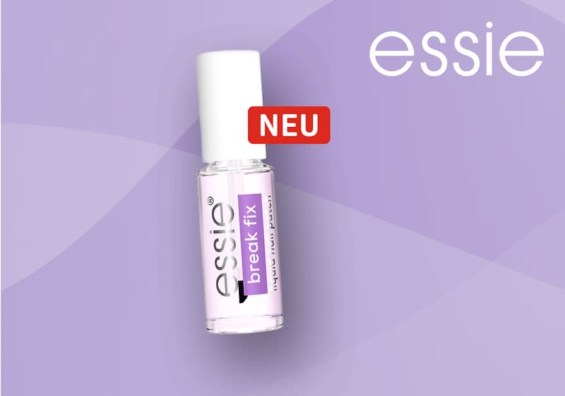 Eine lilafarbene Nagellackflasche der Marke Essie mit der Aufschrift „break fix“ steht vor einer weißen Büste mit einem lila Essie-Pflaster über einem Riss im Gesicht