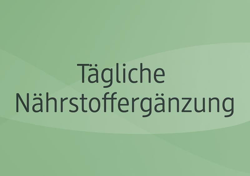 Der Text „Täglicher Nährstoffboost“ auf einem hellgrünen Hintergrund