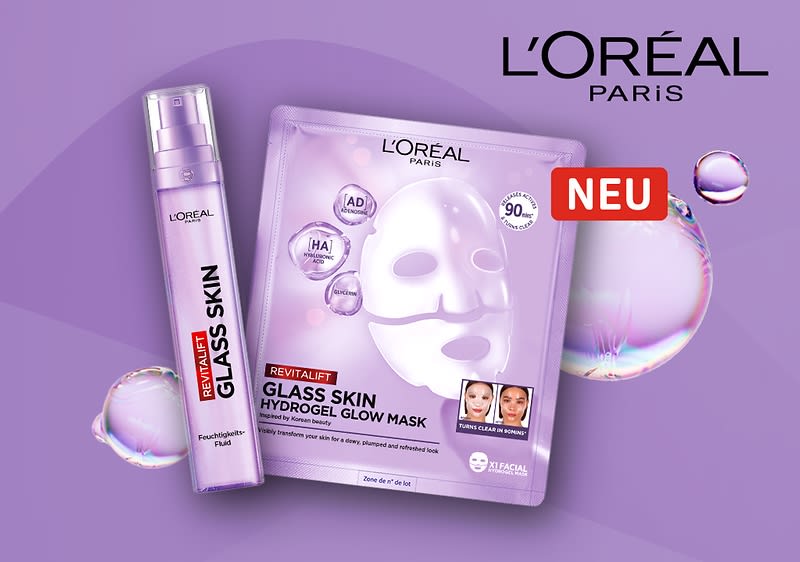 Lila Verpackung einer L'Oréal Paris Revitalift Glass Skin Hydrogel Glow Mask mit der Aufschrift „90% Inhaltsstoffe natürlichen Ursprungs“ und einem lila Flakon mit der Aufschrift „Revitalift Glass Skin“