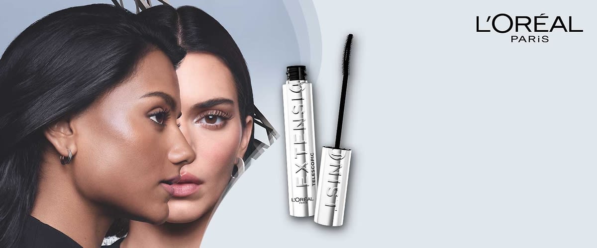 Eine silberne Mascara-Flasche mit der Aufschrift „EXTENSIL“ und einem schwarzen Bürstchen, daneben das Logo von L'Oréal Paris