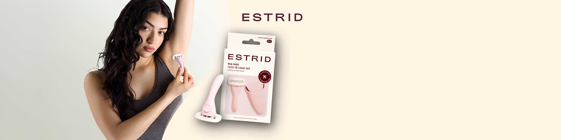 Verpackung eines rosa Rasierersets der Marke ESTRID mit Aufschrift „the mini razor & case set“, abgebildeter kleiner rosa Rasierer und passendes rosafarbenes Schutzetui, Markenname ESTRID oben rechts im Bild