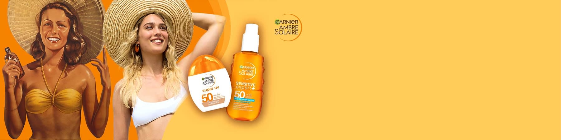 Zwei orange-weiße Sonnenschutzflaschen der Marke Garnier Ambre Solaire, links eine kompakte Flasche mit Aufdruck „super uv 50“ und rechts ein Spray mit Aufdruck „Sensitive Expert+ 50“ und zusätzlichem blauen Schriftfeld