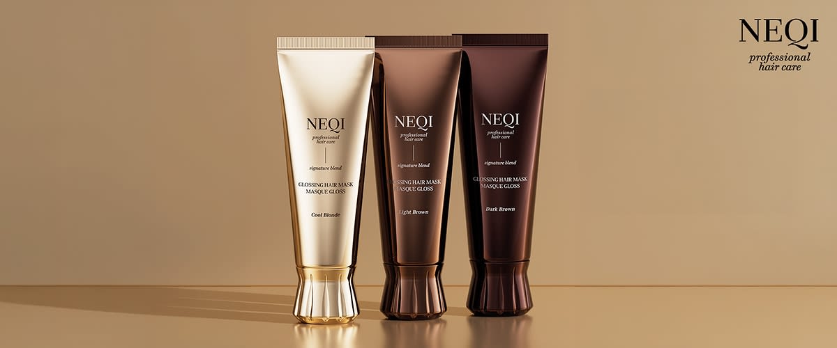 Drei stehende Tuben Haarmaske der Marke NEQI in goldener, heller brauner und dunkler brauner Verpackung mit der Aufschrift „NEQI professional hair care“ und Sortenbezeichnungen „Cool Blonde“, „Light Brown“, „Dark Brown“