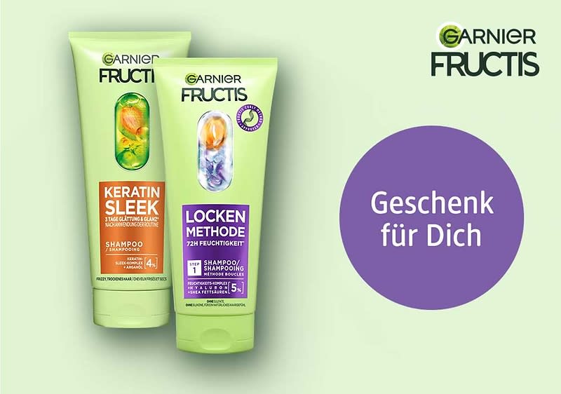 Zwei grüne Tuben Garnier Fructis Shampoo; links „Keratin Sleek“ in orangeem Feld, rechts „Locken Methode“ in violettem Feld, rechts daneben lila Kreis mit Text „Geschenk für Dich“ und oben rechts Garnier Fructis Logo