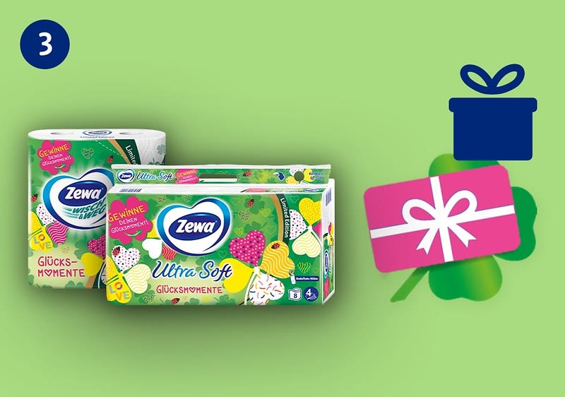Zewa Ultra Soft Taschentuchpackung und Zewa Toilettenpapierpackung mit grün-gelbem Design, Aufschrift „Zewa Ultra Soft“ und „Glücksmomente“, links oben blauer Kreis mit weißer „3“, rechts ein blaues Geschenk-Icon