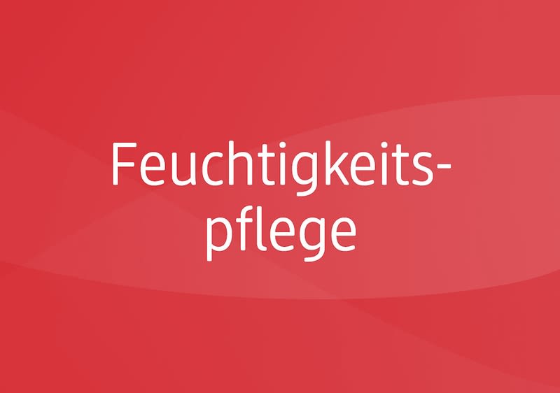Das Wort Feuchtigkeitspflege auf rotem Grund