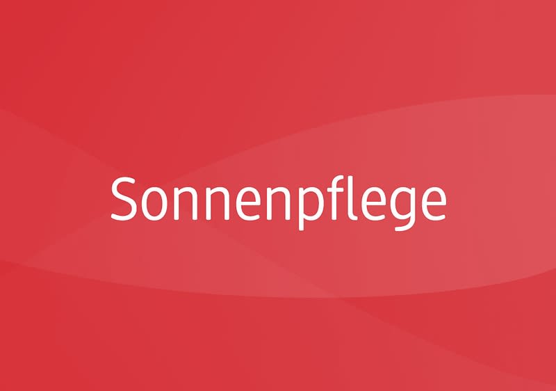 Das Wort Sonnenpflege auf rotem Grund