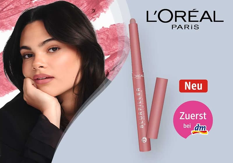 Werbung für L'Oréal Paris: Lippenkonturenstift in roséfarbener Stiftverpackung mit der Aufschrift „BLUR FILLER LIP CONTOUR“, daneben Porträt einer Frau mit dunklen Haaren und roséfarbenem Lippenmake-up, oben rechts Logo „L'ORÉAL PARIS“, rote Markierung „Neu“ und runder roter Button mit Text „Zuerst bei dm“