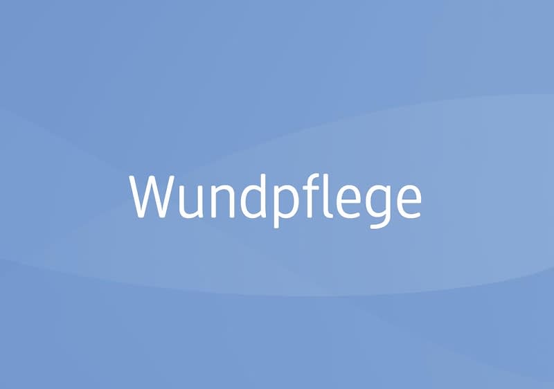 Blaues Hintergrundbild mit dem weißen Text „Wundpflege“