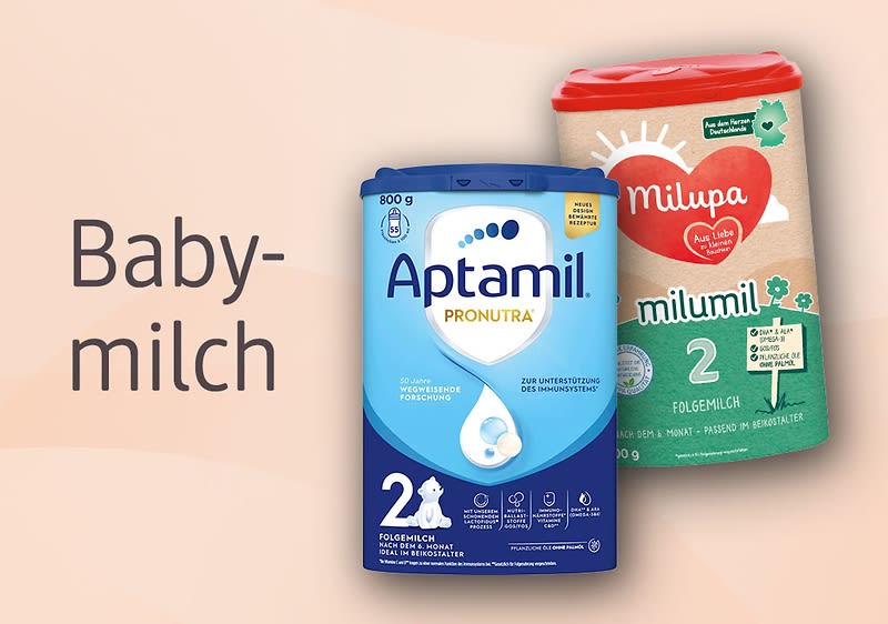 Eine Packung Aptamil Pronutra Babymilch und eine Packung Milupa Milumil Folgemilch stehen nebeneinander. Links im Bild steht der Text Babymilch