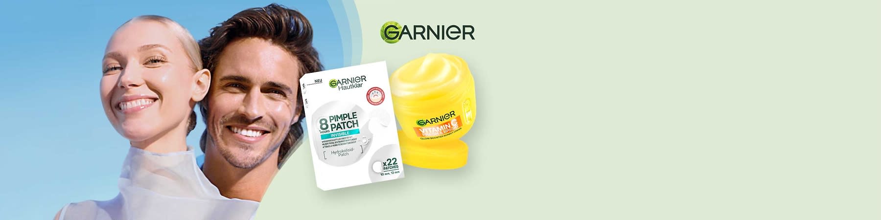 Packshot zweier Garnier-Produkte: links weiße Schachtel „Garnier Hautklar 8 Pimple Patch Invisible“ mit Hinweis „Hydrokolloid-Patch“ und „x22 patches“, rechts gelbe Dose „Garnier Vitamin C Fresh Bright“ mit sichtbarer Cremefüllung and geöffnetem Deckel