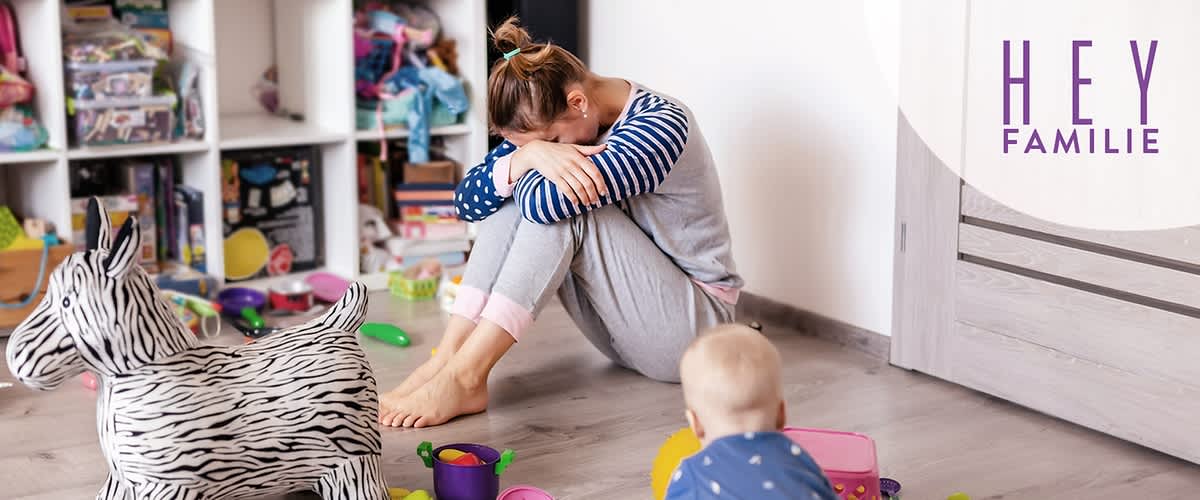 Mutter erschöpft mit Kind