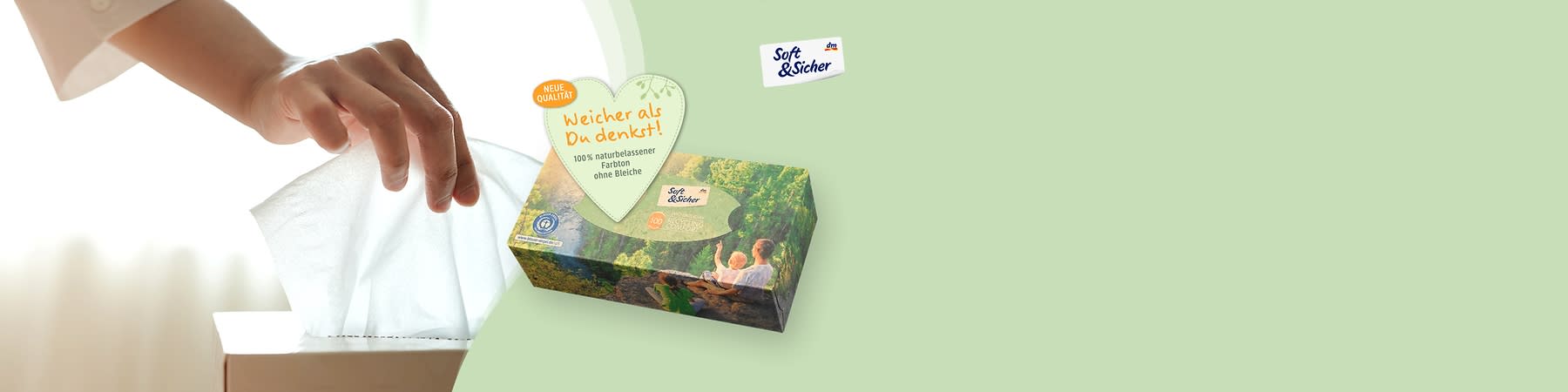 Soft & Sicher Hand greift Tuch