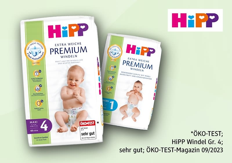 Eine Packung und eine einzelne Windel der Marke HiPP mit der Aufschrift „Extra weiche Premium Windeln Gr. 4“ und „ÖKO-TEST sehr gut“, daneben das HiPP-Logo