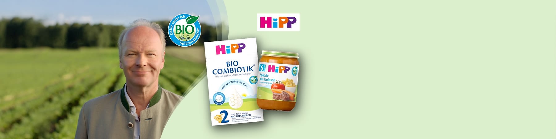 Eine Packung Hipp Bio Combiotik Folgemilch mit der Aufschrift „Bio Combiotik mit natürlichen Milchsäurekulturen“ und ein Glas Hipp Spätzle mit Gulasch. Oben rechts das Hipp Logo