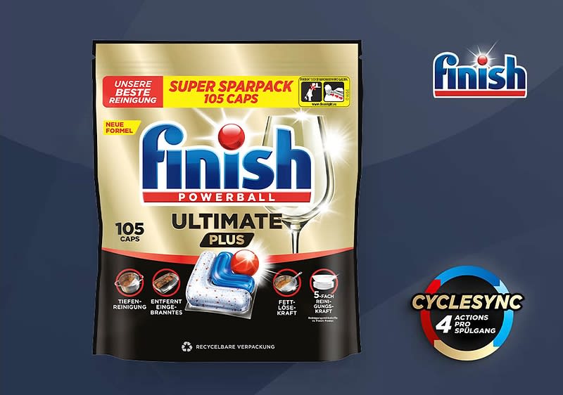 Finish Powerball Ultimate Plus Geschirrspültabs in goldener Standbodenpackung mit rotem „NEU“-Label, sichtbar ist Markenname „finish“, Produktbezeichnung „ULTIMATE PLUS ALL IN 1“, Abbildung eines blauen-weißen Tab mit rotem Kugelkern, Symbole für 1–40 Spülgänge und „CYCLESYNC 4 ACTIONS PRO SPÜLGANG“ sowie ein Weinglas als Sauberkeitsanzeige