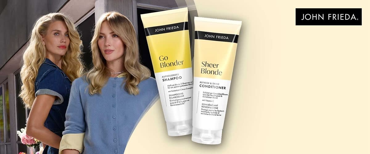 Zwei Produktverpackungen von John Frieda: Links eine Tube mit der Aufschrift „Go Blonder Aufhellendes Shampoo“, rechts eine Tube mit der Aufschrift „Sheer Blonde Refresh & Shine Conditioner“. Oben rechts das Logo von John Frieda