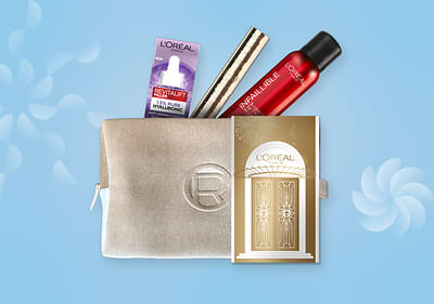 L'Oréal Paris zlatna kozmetička torbica s proizvodima