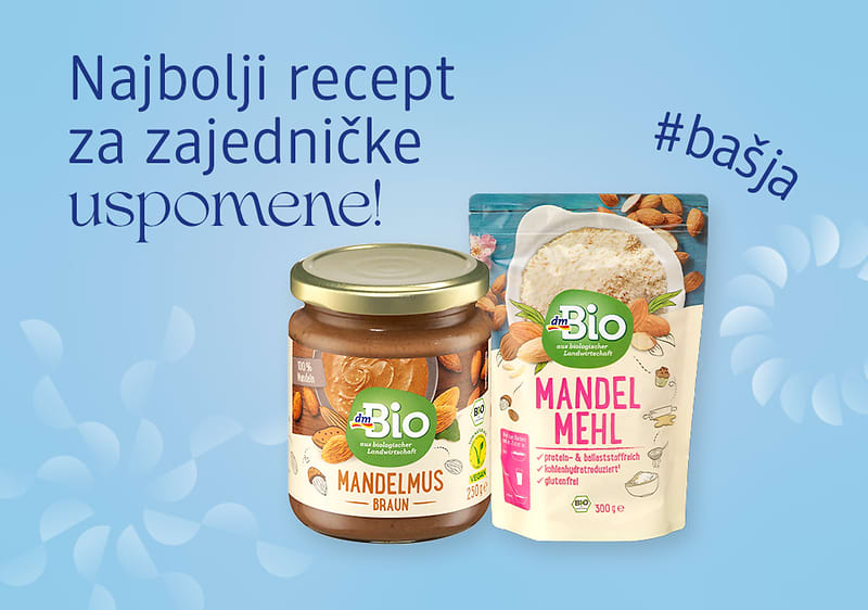 Dva proizvoda za pečenje kolača na plavoj pozadini s bijelim pahuljicama