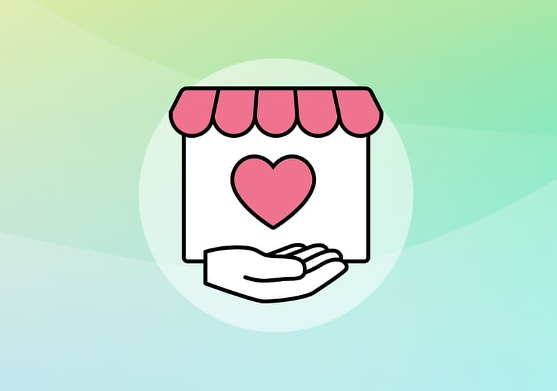 Markt mit einem Herz in der Mitte, darunter eine Hand