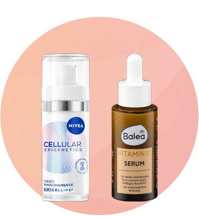 Sieri viso Nivea Cellular Epigenetics e Balea Vitamina C su sfondo rosa sfumato