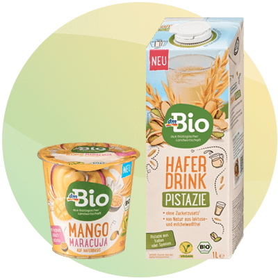 Bevanda vegetale all'avena e pistacchio e dessert vegetale con mango e maracuja di dmBio.