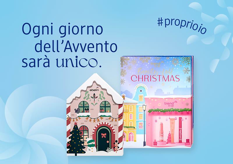 Calendari dell'Avvento a marchio dm con case colorate e scritta Ogni giorno dell'Avvento sarà unico