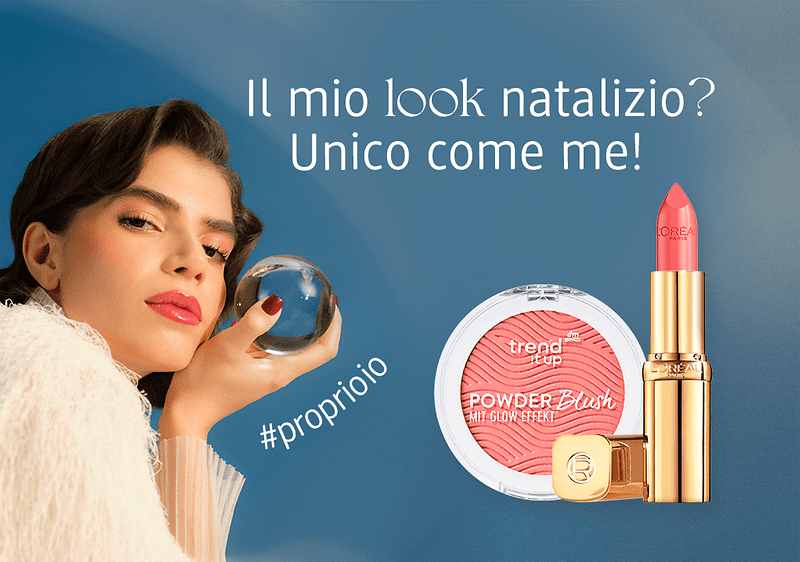 Ragazza castana con look da festa tiene una sfera di vetro in mano. Sulla destra ci sono in primo piano due prodotti make-up: blush rosa trend it up e rossetto L'Oreal Paris.