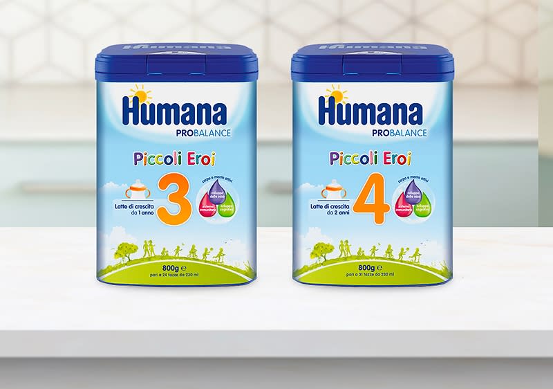 Latte di crescita Humana Piccoli Eroi 3 e 4 su tavolo cucina