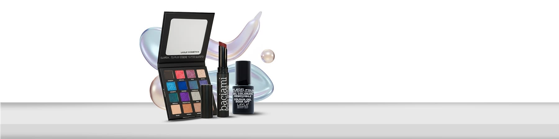 Trucco con palette ombretti, rossetto e smalto Layla Cosmetics