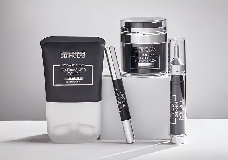 Prodotti Botox-like effect Dermolab su sfondo grigio tenue